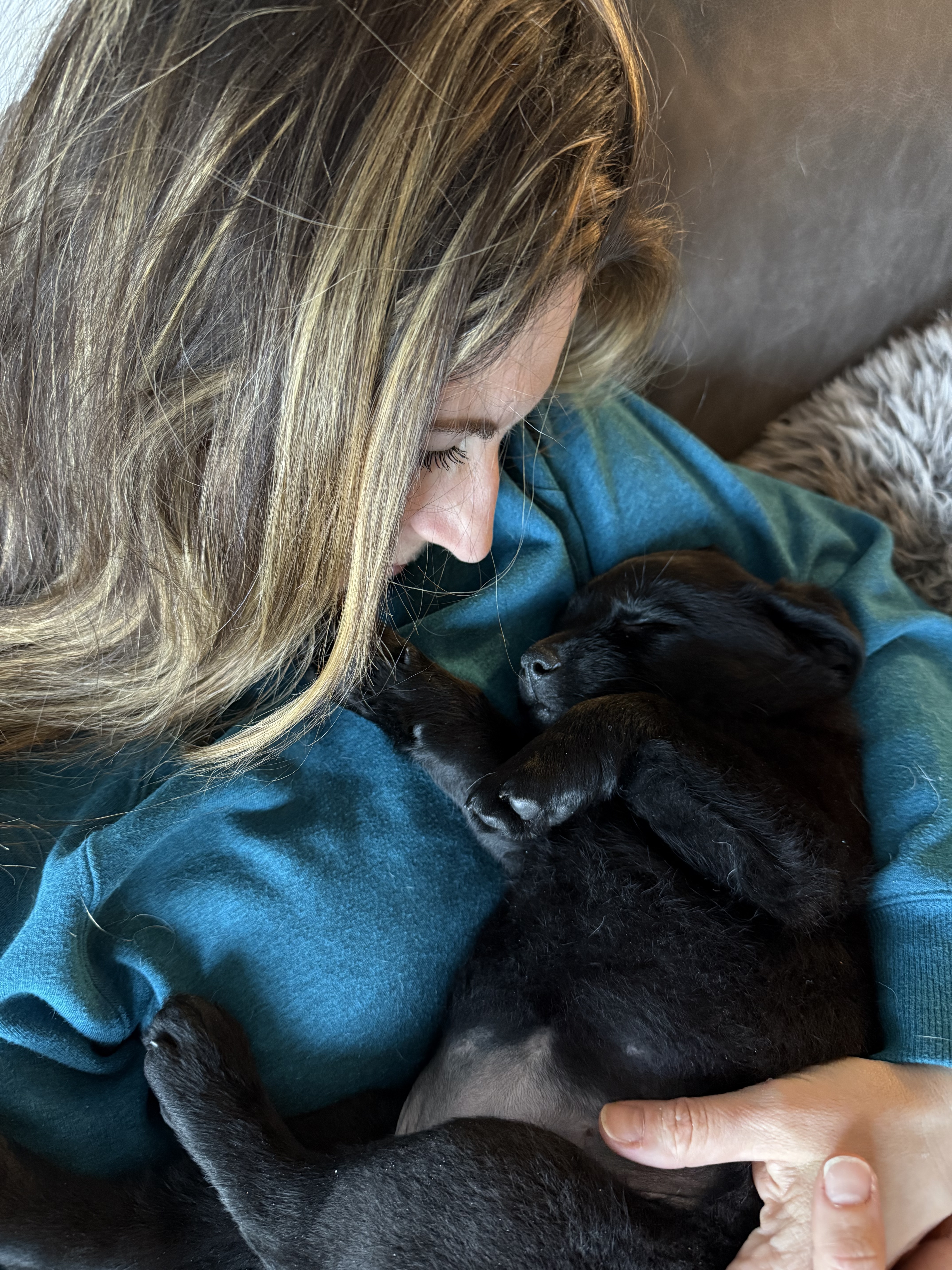 Me holding Luna as a young puppy.
